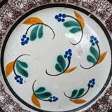 Old plate with brown border and flowers called black bottom