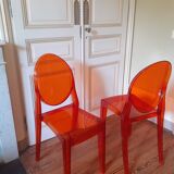 2 Chaises orange Victoria Ghost design Starck éditées par Kartell