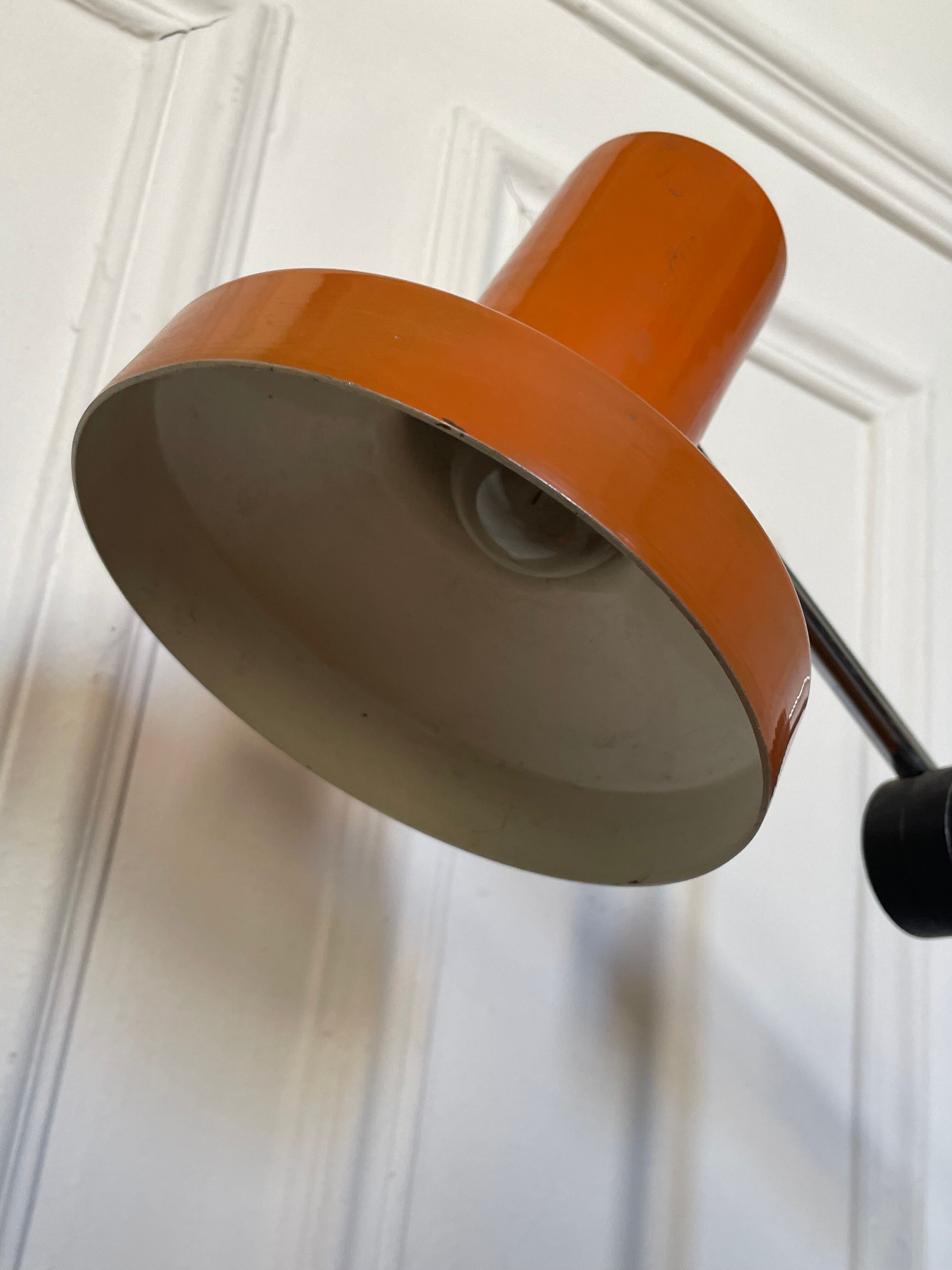 Orange articulated lamp design 1970