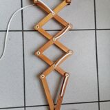 Pair of wooden scissor wall lamps
