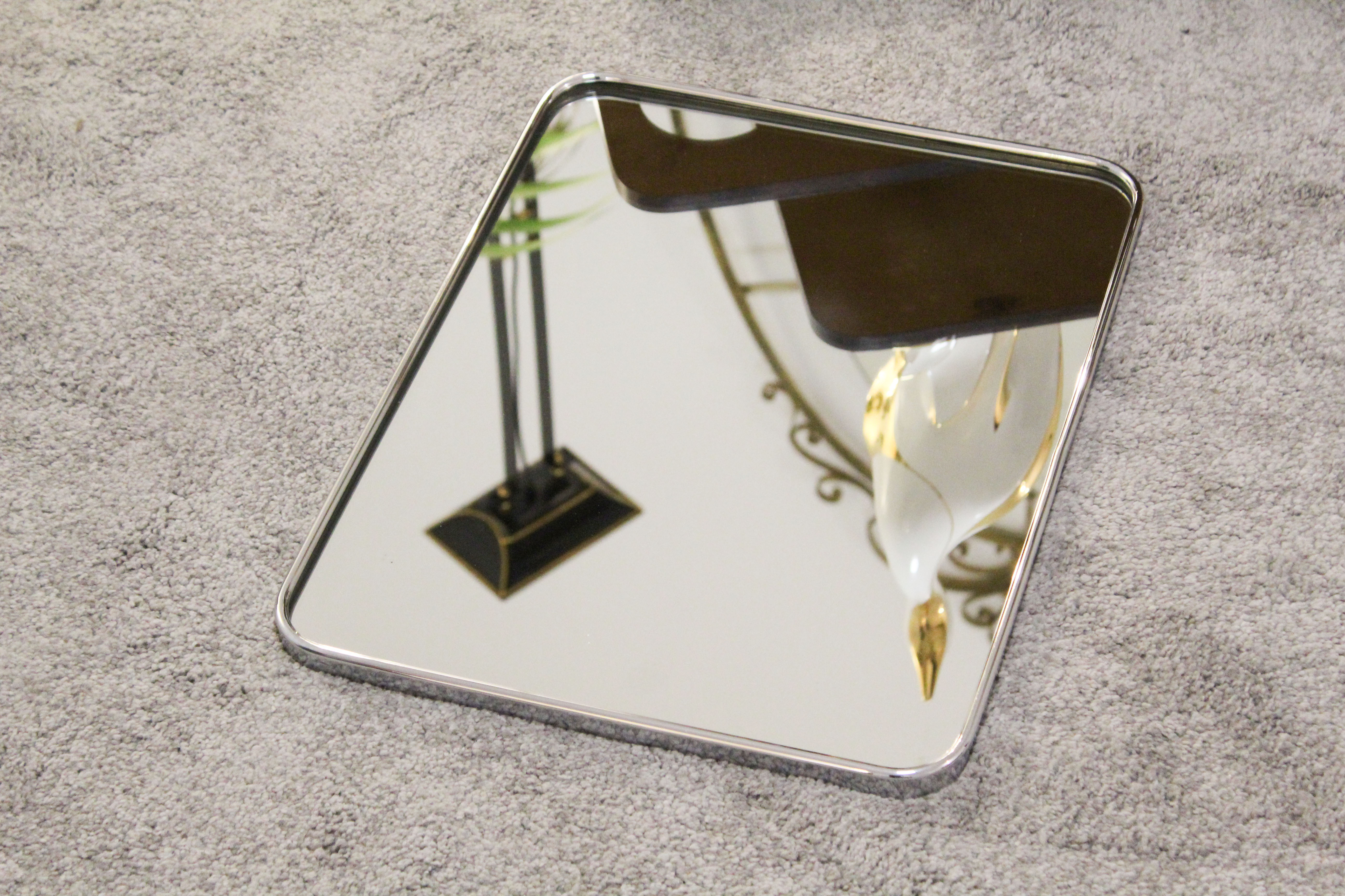 Mirror with chrome chronicle, Italy 60