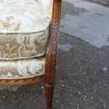 Pair of Louis XVI style armchairs with ears