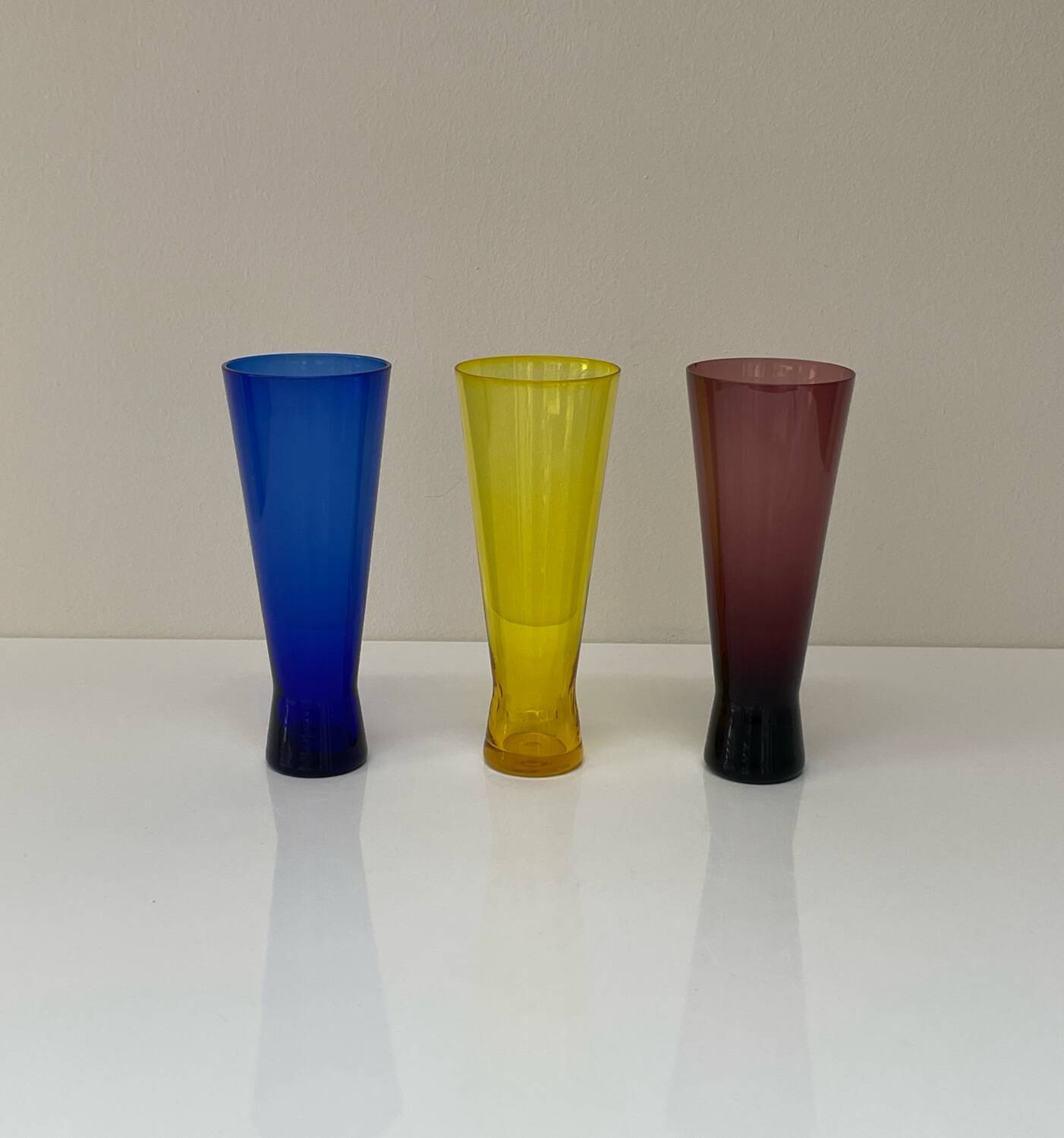 Set of three vintage coloured glasses from the 70s.