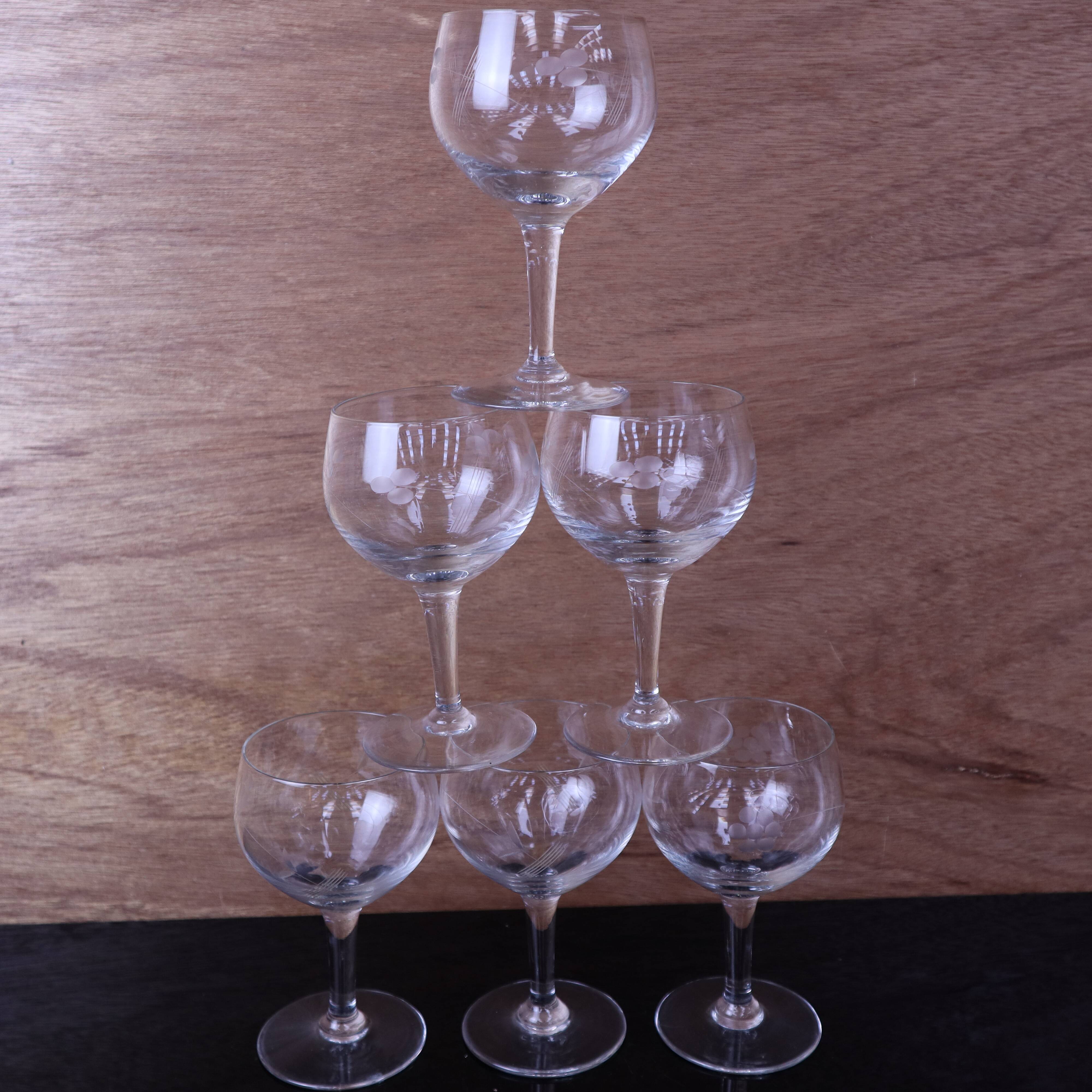 Set of engraved vintage flower balloon red wine glasses.