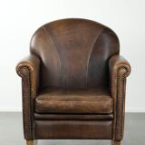 Armchair / lounge chair made of sheepskin leather with characterful patina