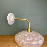 Vintage glass wall lamp with a white Clichy shade.
