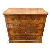 Antique English commode in flame walnut.
