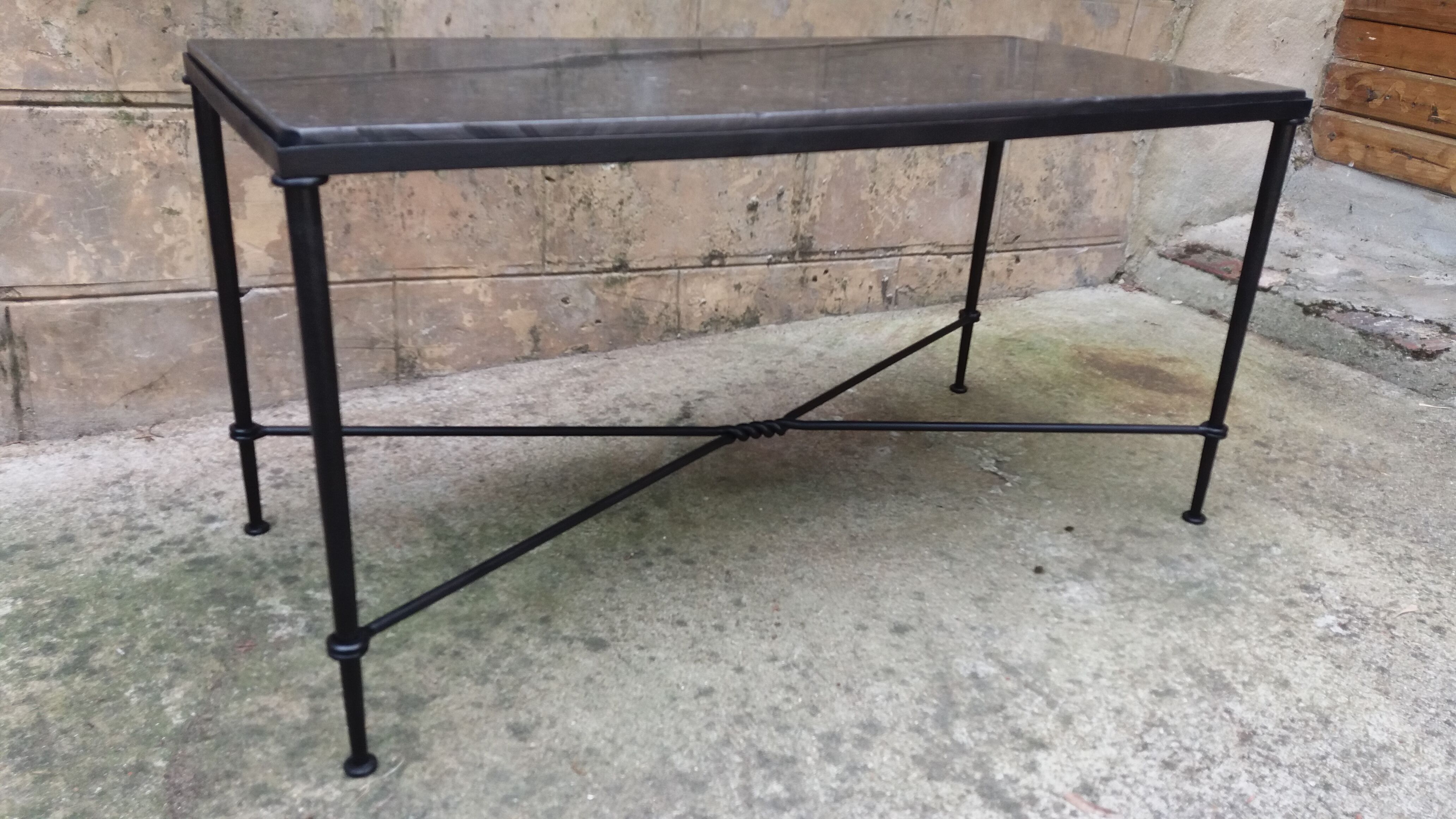 Wrought iron coffee table and marble top