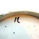 Old dabbling plate with 2 artichokes with leaves and several asparagus