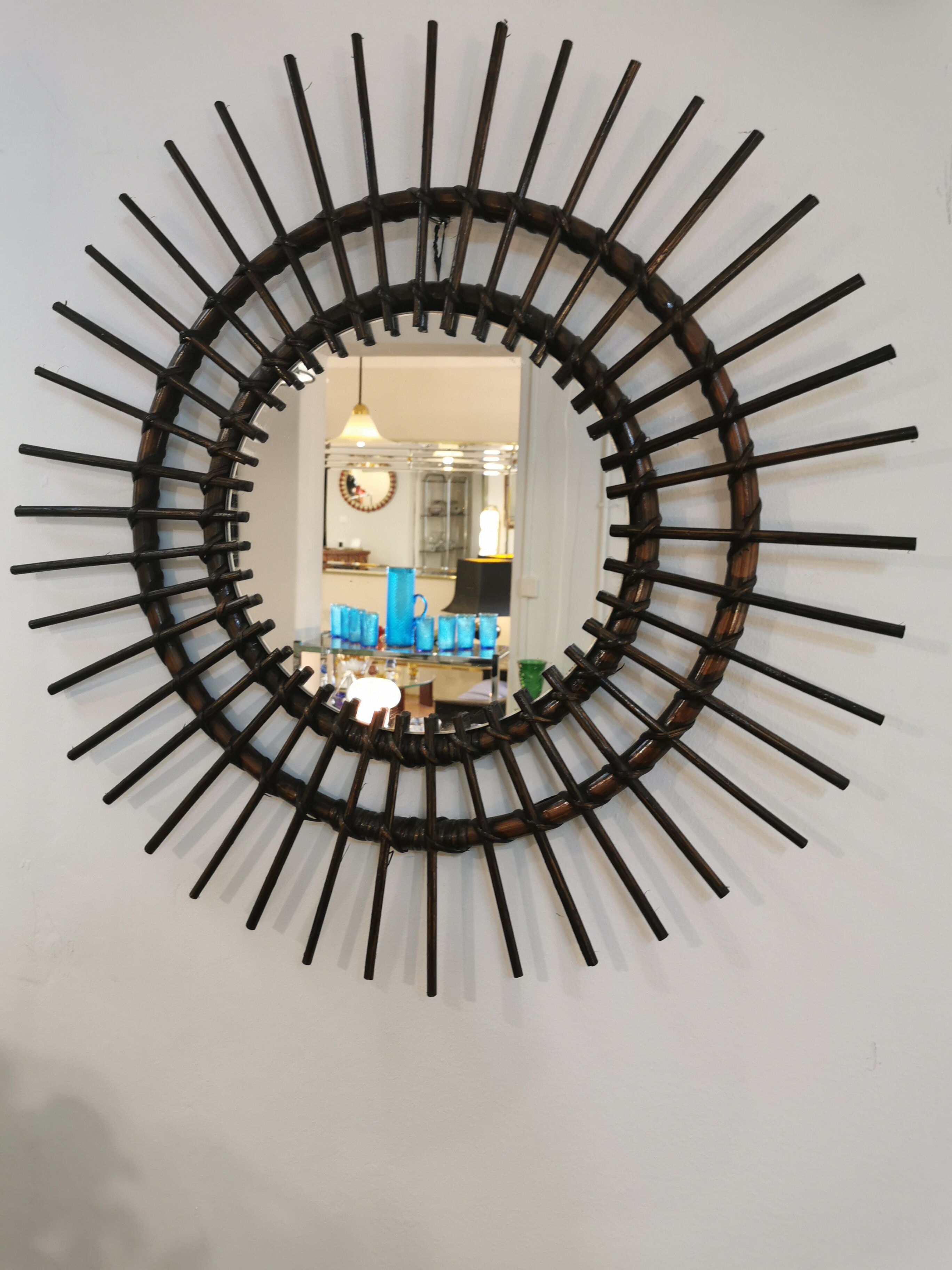 Vintage sun mirror in 60s dark rattan 56cm