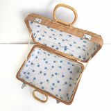 Rattan suitcase and wicker interior flowered