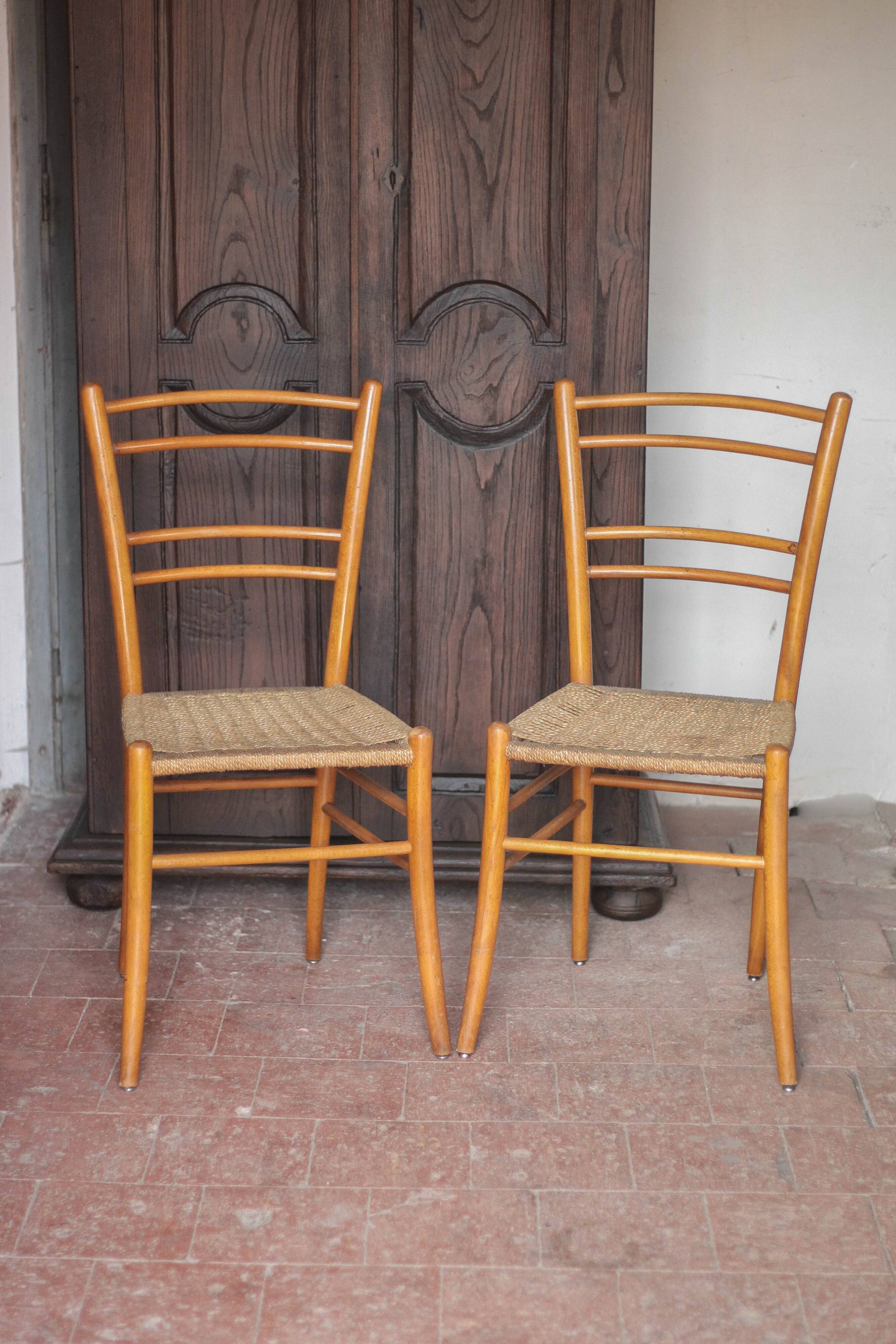 Pair of wooden chairs with vintage rope seats, vintage rope chairs