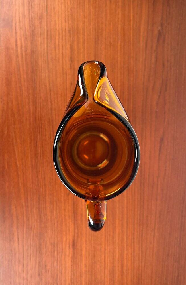 Amber glass carafe from the mid-century German Jagdhaus series and drinking glasses by Wilhelm Braun-Feldweg for Hirschberg, 1960s, set of 7.