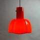 Red glass flower-shaped pendant by Glashütte Limburg.
