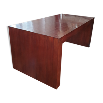 Large varnished wooden dining table