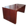 Large varnished wooden dining table
