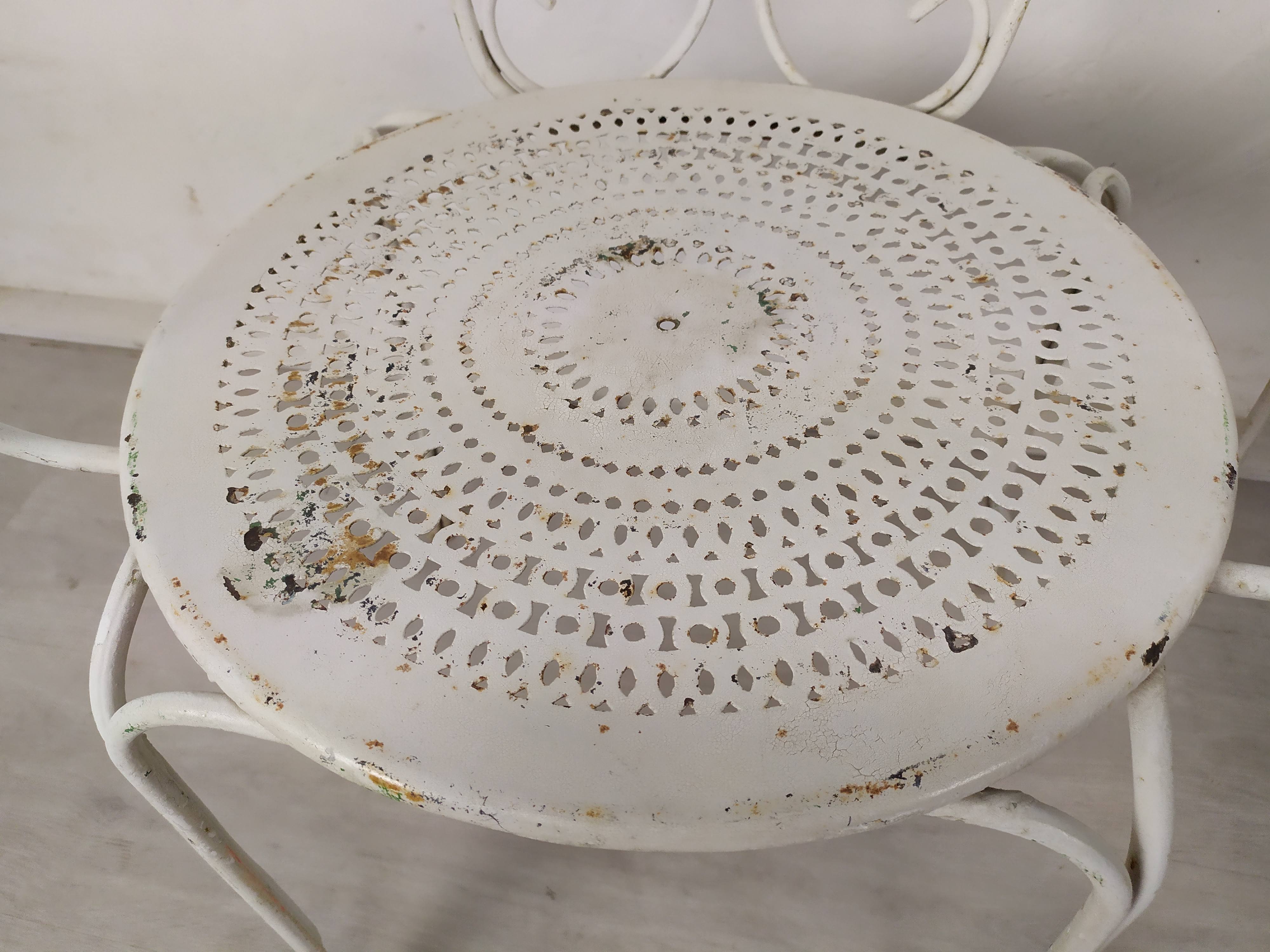 4 wrought iron garden armchairs