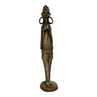 Old African art woman statuette