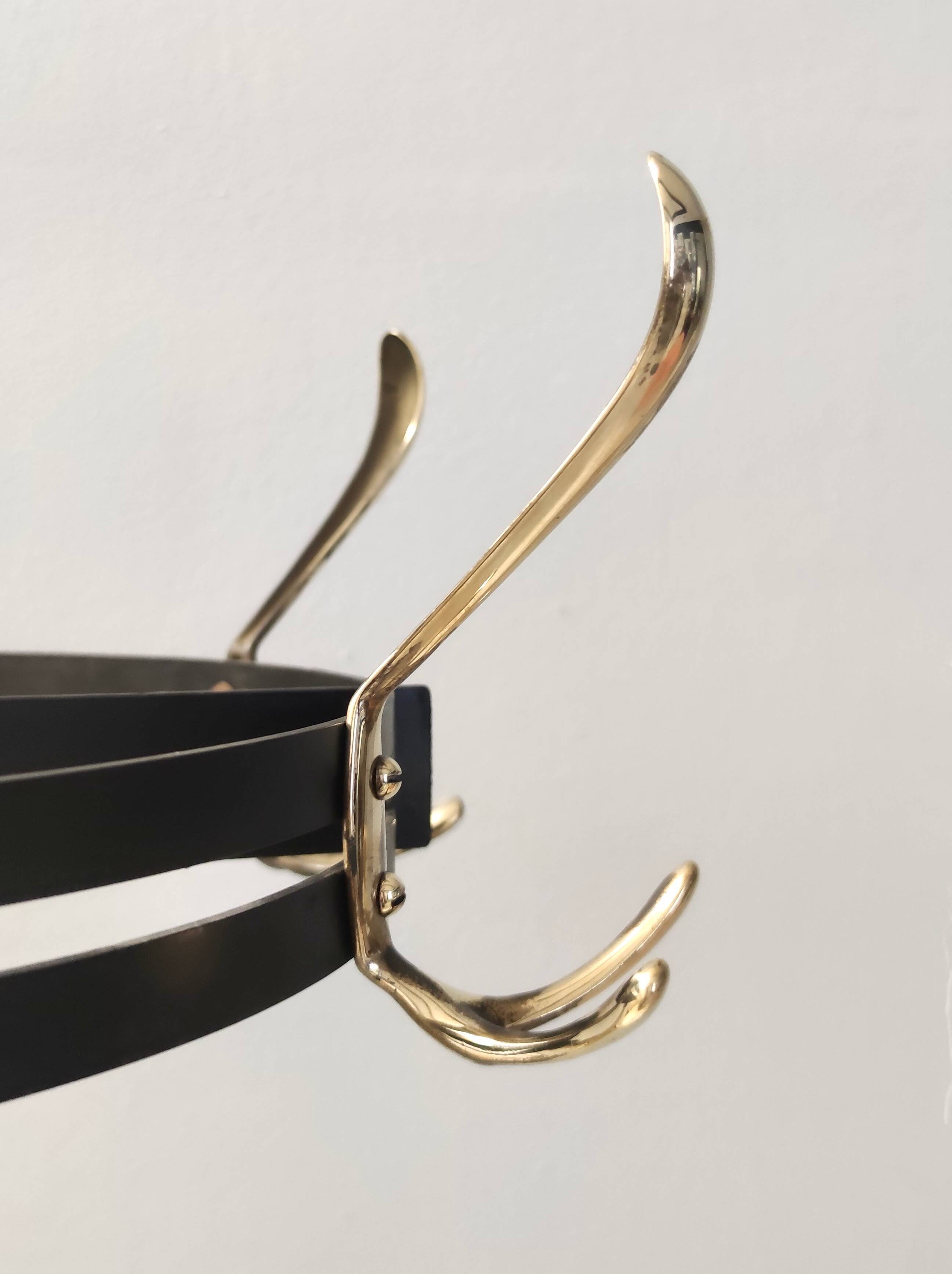 Revolving Brass and Varnished Iron Coat Rack, Italy