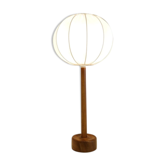Mid-century solid teak table lamp from the 1960s Sweden.