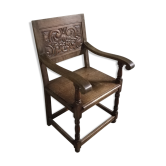 Oak armchair adorned