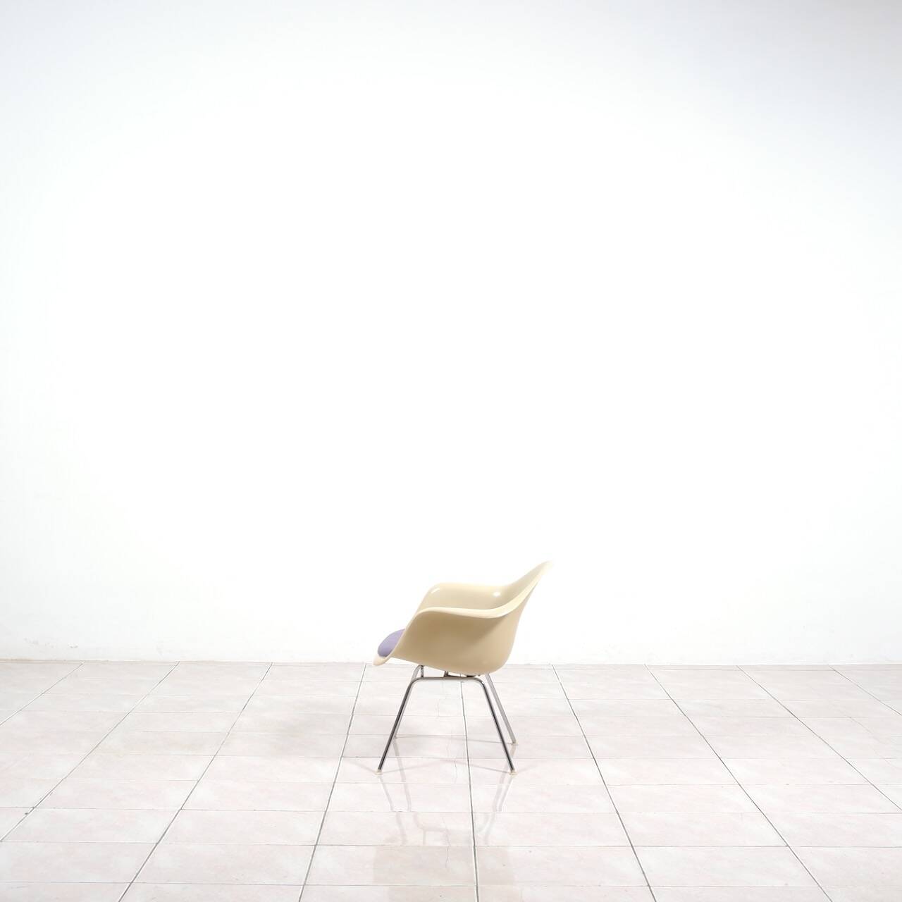 4 Eames DAX fiberglass lounge chairs with purple upholstery by Herman Mille