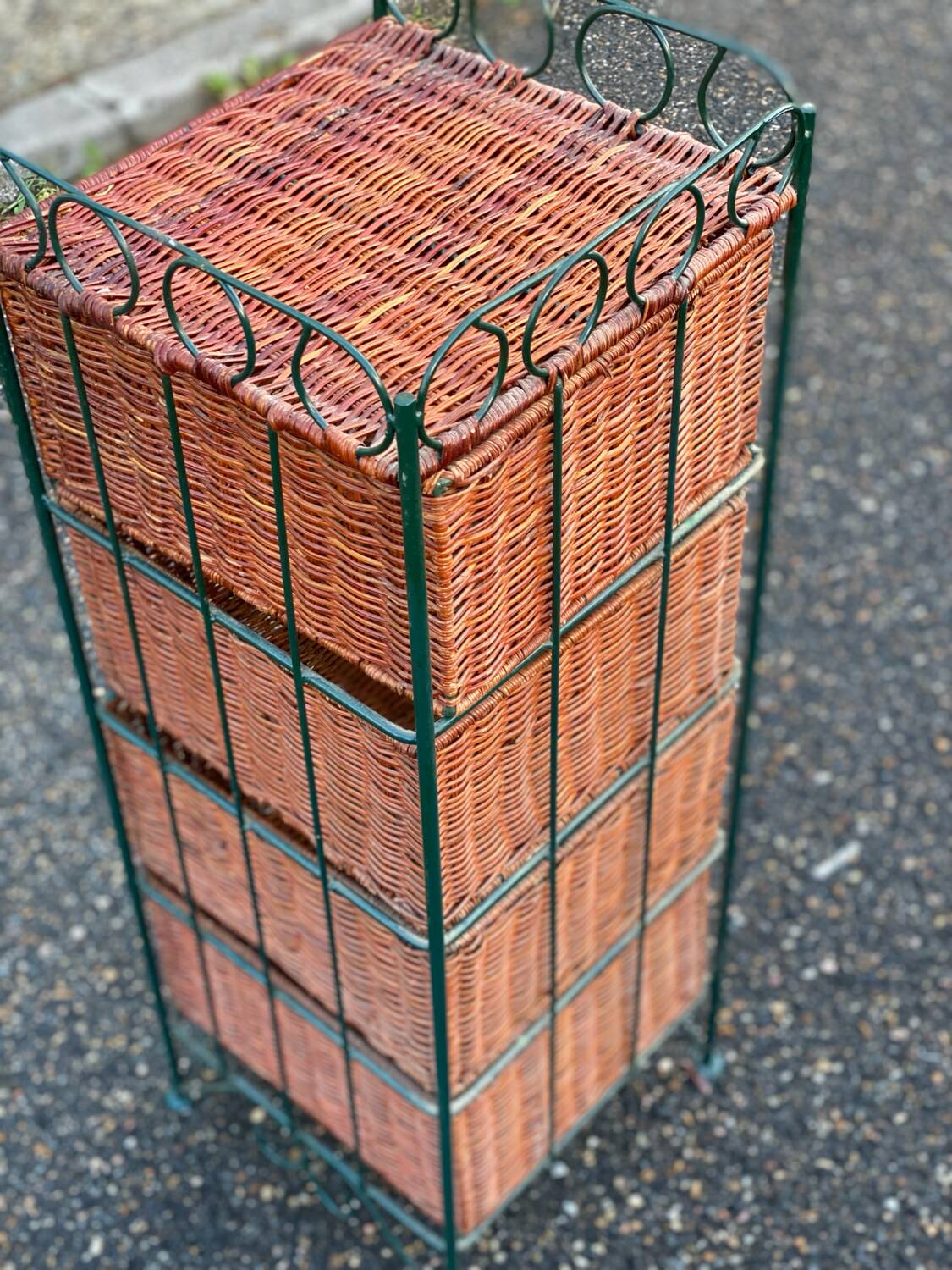 Metal chest of drawers and four woven wicker baskets