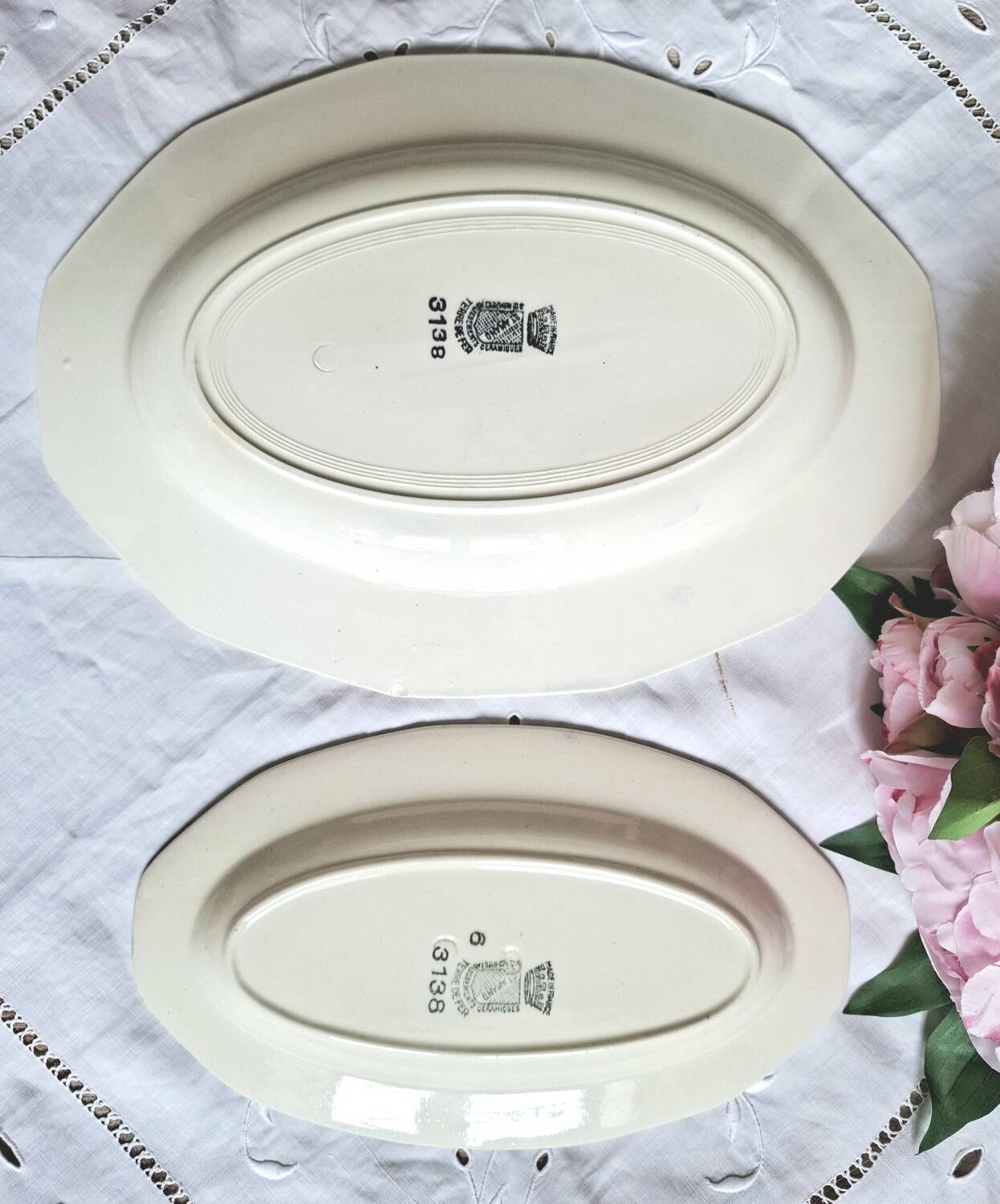 Mismatched antique flat plates accompanied by dishes.