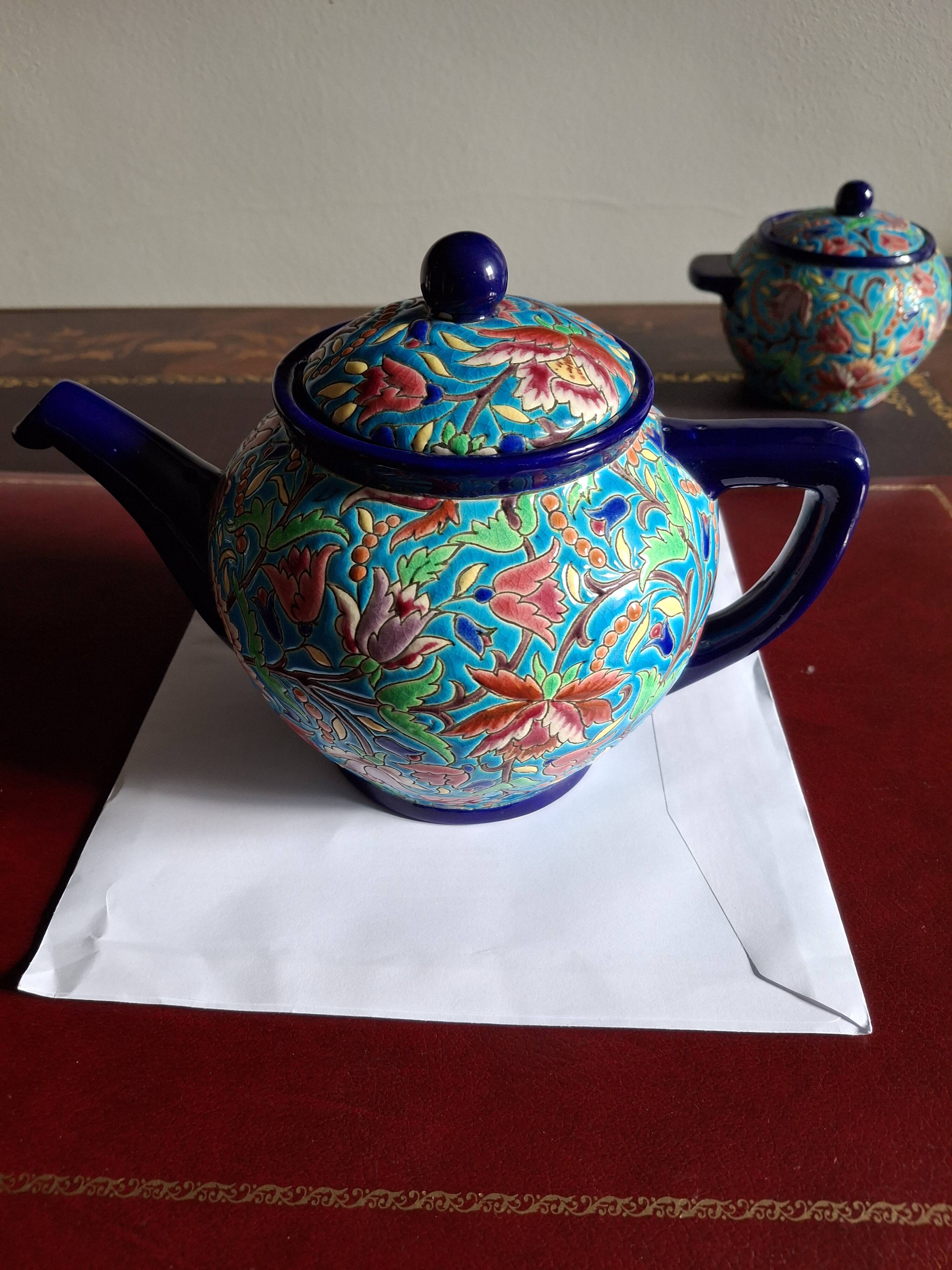 Cloisonné enamel tea service from Longwy in excellent condition.