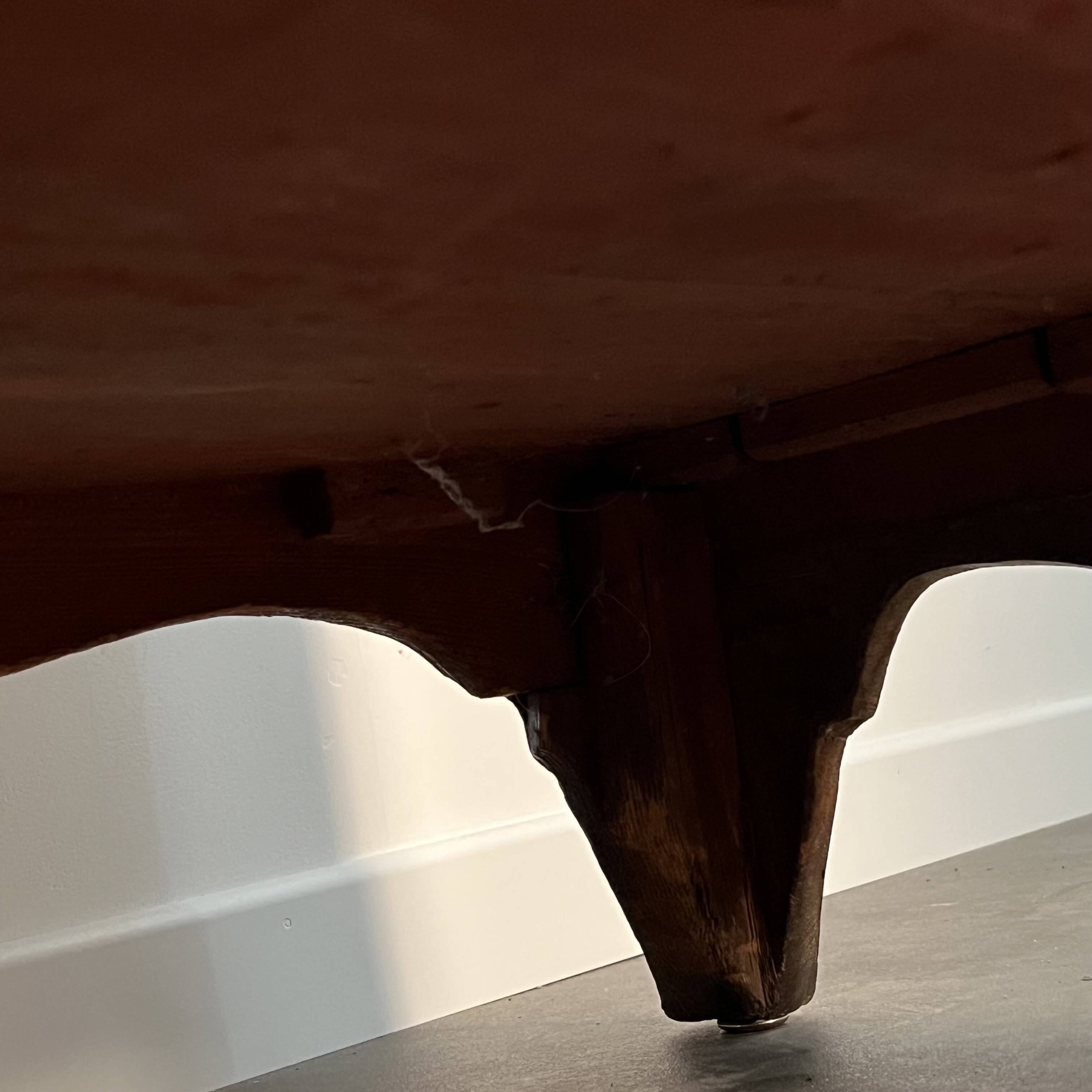 English commode from the George III Regency period, bombe shape in mahogany veneer.