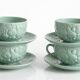 Set of 4 soup / consommé cups and saucers in ceramic.