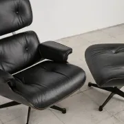 Lounge Chair and ottoman in black leather by Charles & Ray Eames, Vitra