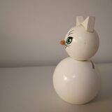 Wooden piggy bank, white cat