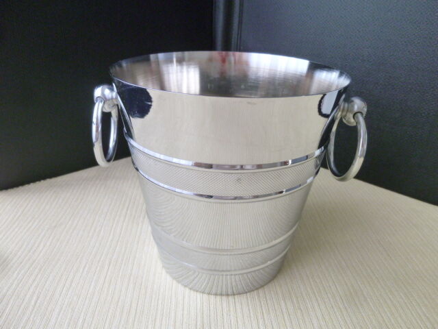 Ice bucket and vintage stainless steel drainer