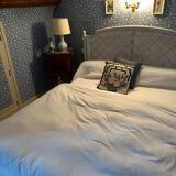 White wooden cane bed