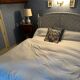 White wooden cane bed