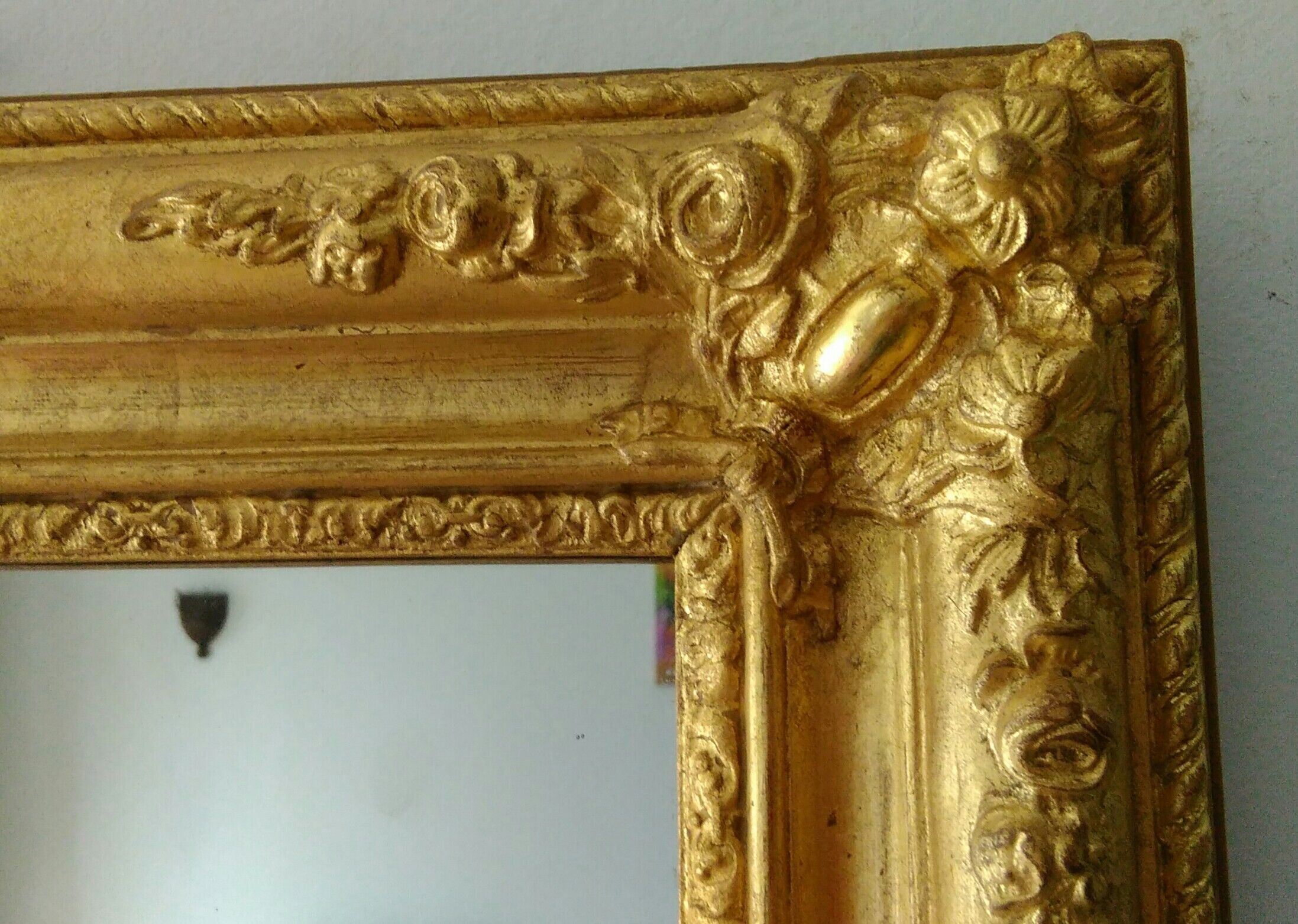Golden romantic mirror with gold leaf