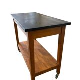 Vintage wooden high table on wheels