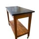 Vintage wooden high table on wheels