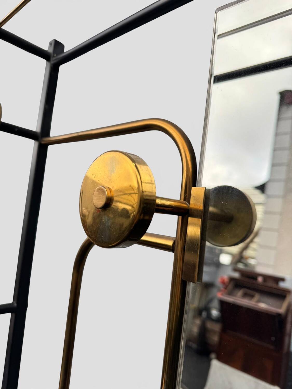 1960s modernist wardrobe. Gold lacquered metal.