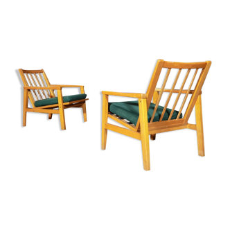 Pair of dark green armchairs