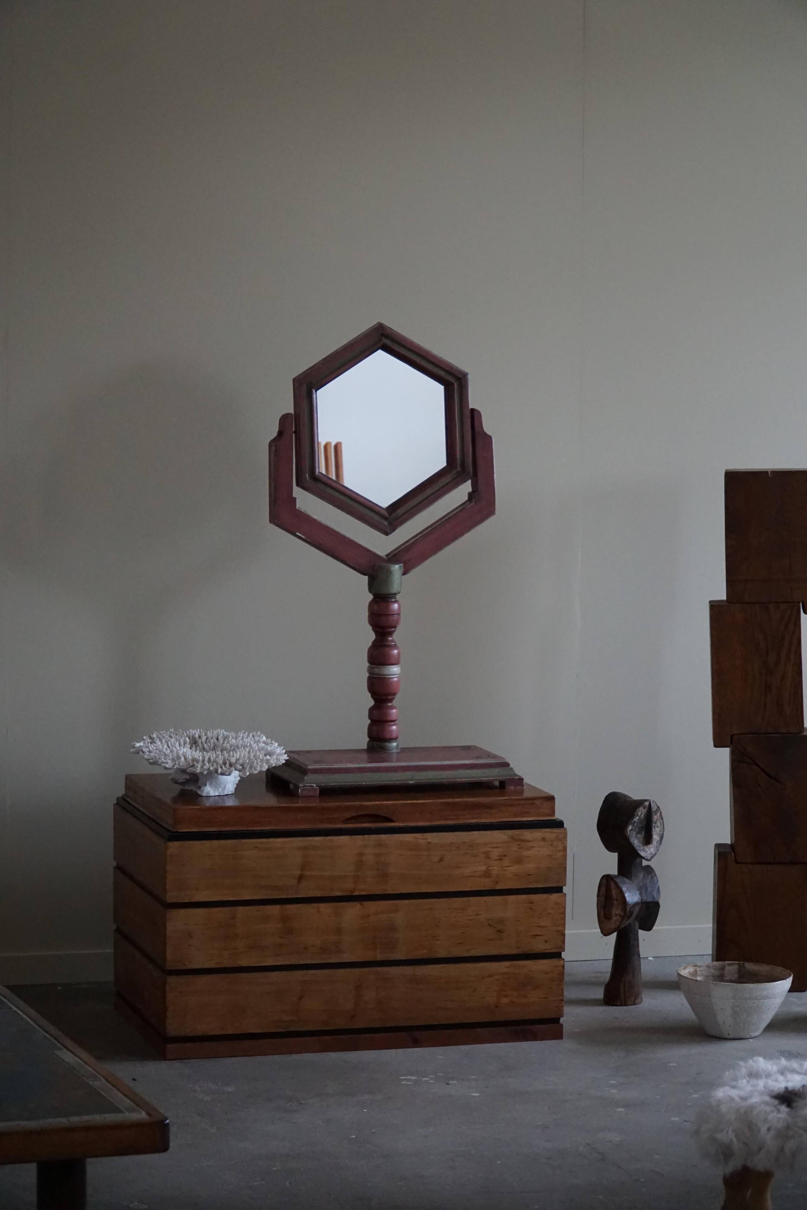 A pine table mirror by a Swedish cabinetmaker, folk art, early 20th century.