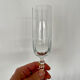 Set of 8 crystal champagne flutes in classic design.