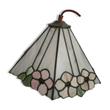 Tiffany-style stained glass lampshade with floral motifs.