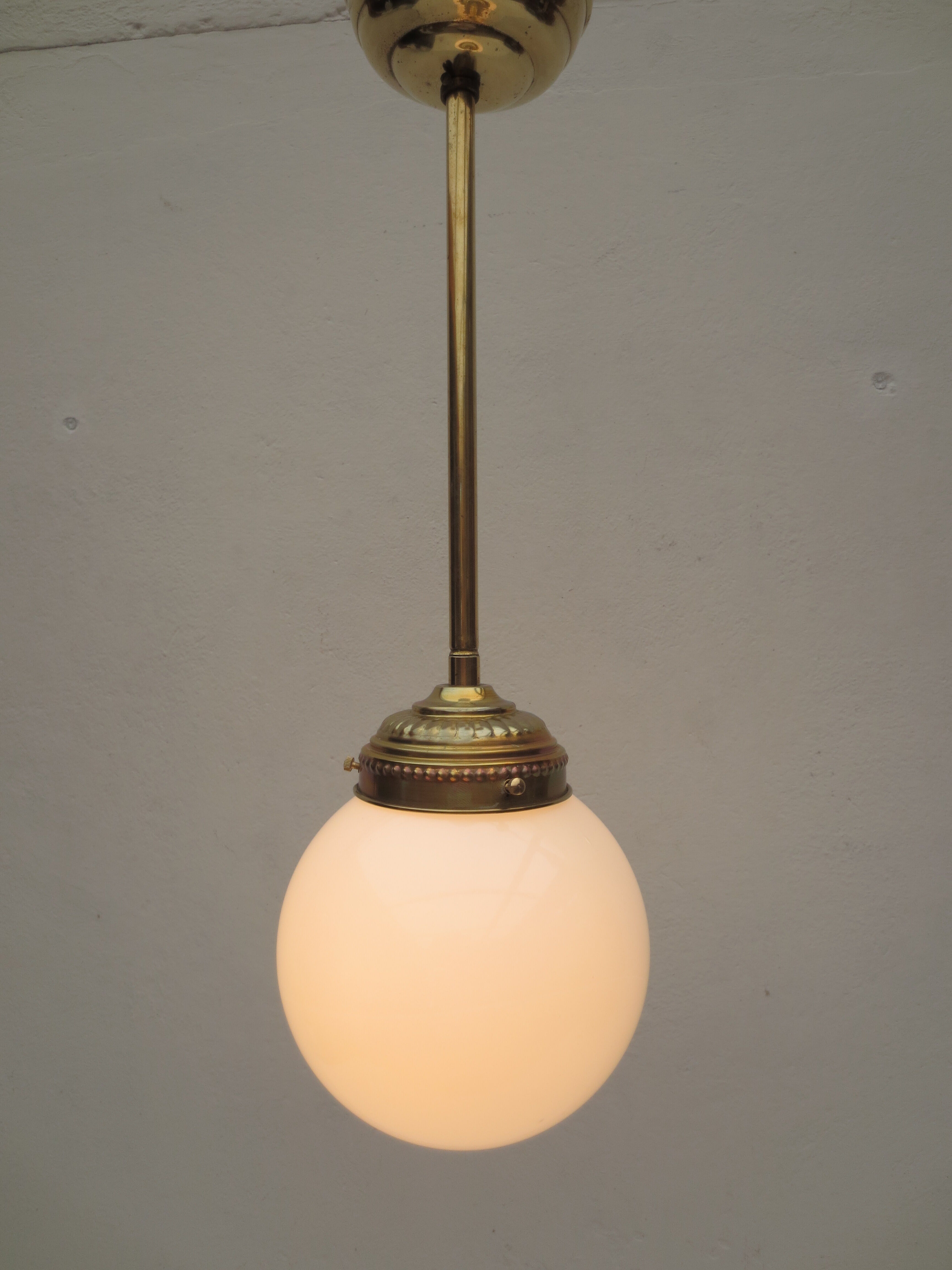 brass and white opaline hanging