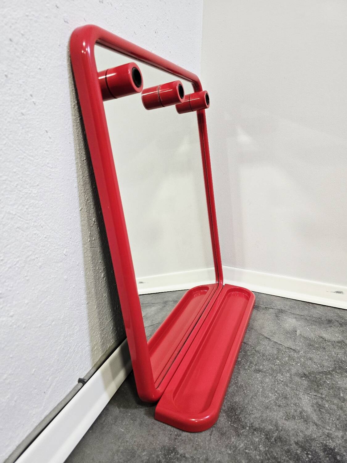 Mirror with a red shelf from the 90s.