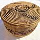 Antique basket with ethnic lid with black/brown and red décor