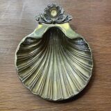 Empty shell pocket in vintage brass
