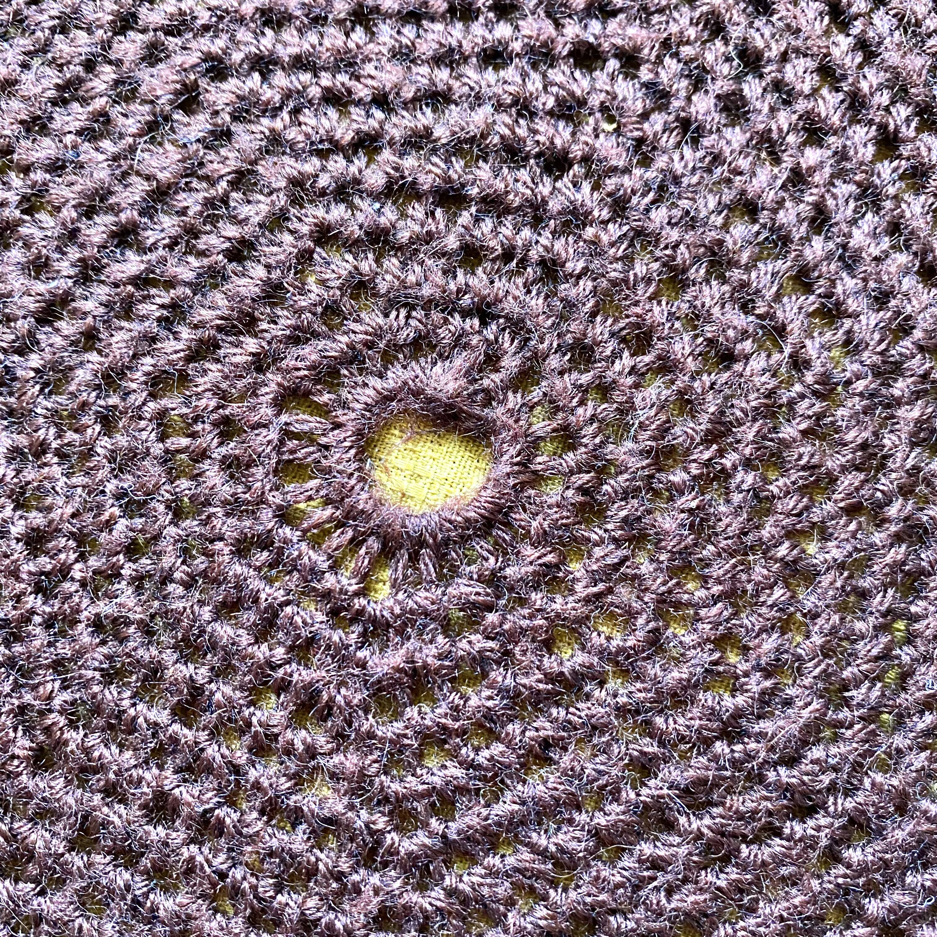 Vintage round crochet cushion