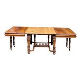 Table à manger extensible style Henri II en noyer massif, XIXème